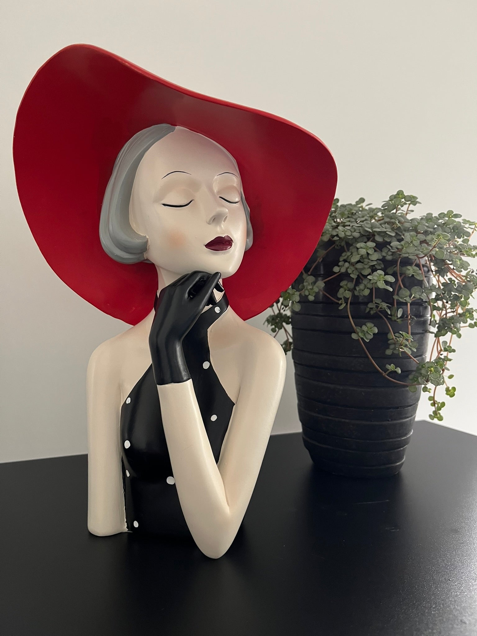 Dekorative Figur mit Hut