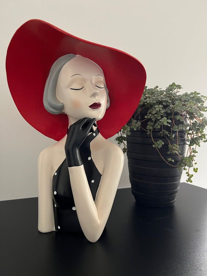 Dekorative Figur mit Hut