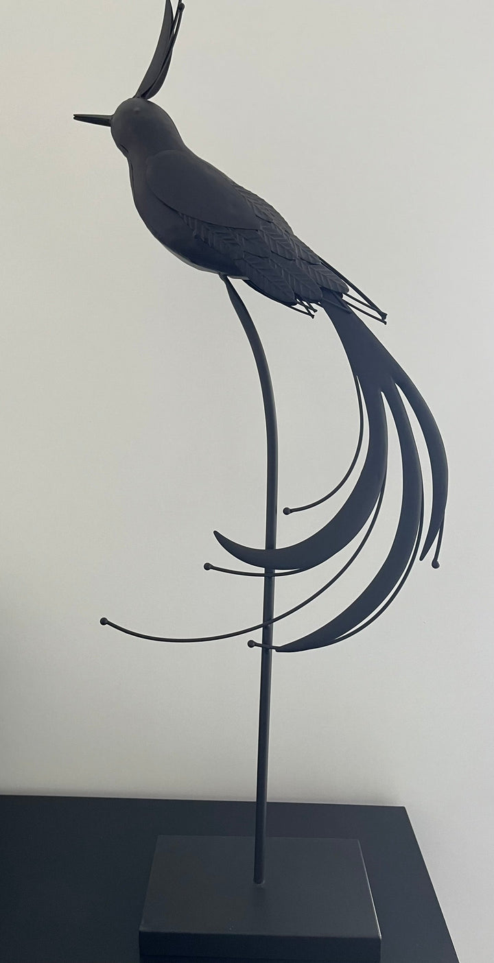 Metallvogel auf Metallständer